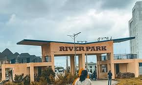Court Orders Status Quo in River Park Estate Dispute, Police Charge Four for Alleged Fraud