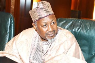 Minister of Defence Abubakar Badaru speaking on the RUSEB-P community policing initiative in Abuja.