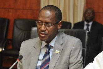 Minister of Housing Ahmed Dangiwa with KTNN team during meeting on Renewed Hope Homeownership Campaign in Abuja