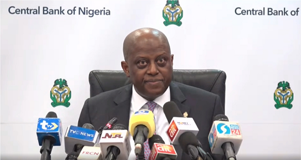 CBN Governor Olayemi Cardoso speaking at MPD 20th anniversary, graph showing Nigeria’s external reserves increase