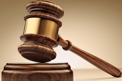 Gavel on courtroom desk during ruling on Lagos-Calabar Coastal Highway legal dispute
