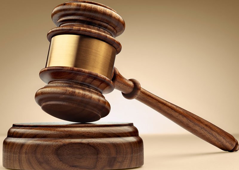 Gavel on courtroom desk during ruling on Lagos-Calabar Coastal Highway legal dispute