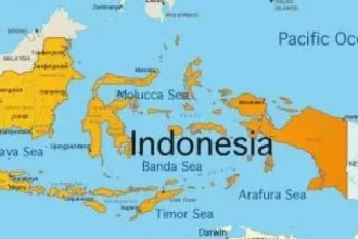 Rescue team digging through landslide debris in Central Java, Indonesia