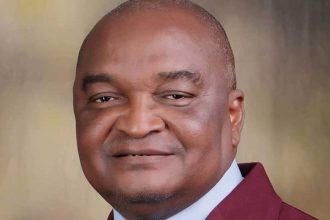 Former NITP president Nathaniel Atebije speaking on professionalism and urban planning ethics at ATOPCON Abuja inauguration.