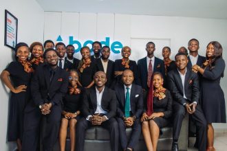 Abode Assets Limited co-founders Jeffrey Ehikioya Itepu and Damilare Oshokoya with management team celebrating four year anniversary